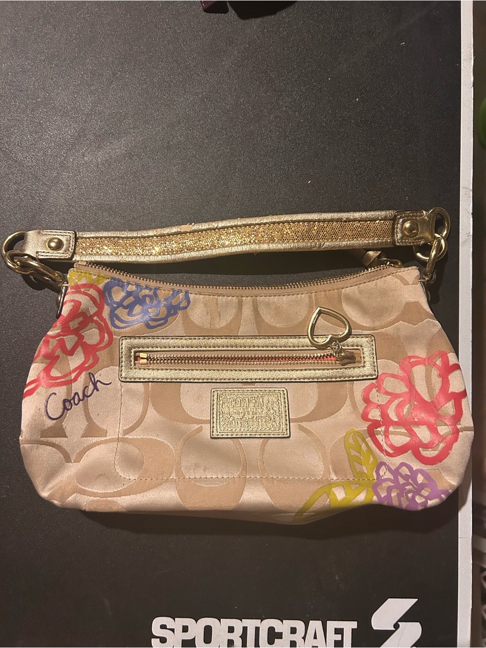 Coach Beige Signature Floral Wristlet with Gold Strap and Multicolor Flowers